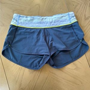 Lululemon Size 4, navy blue/yellow 2.5” Running Short